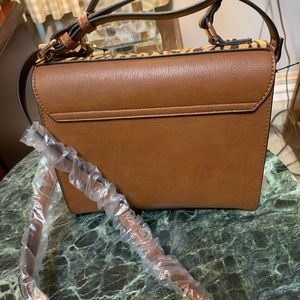 Brown leather Dune bag.